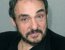  г- (John Rhys-Davies):    ()